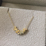 Gold Necklace With Heart Pendants