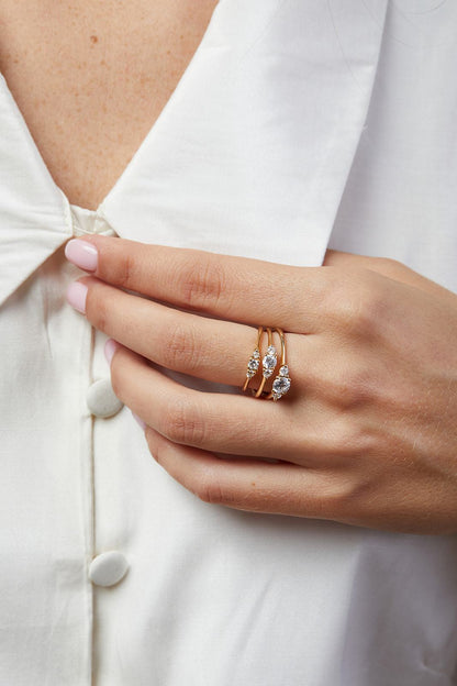 Natural diamond anemone ring with ten point central stone