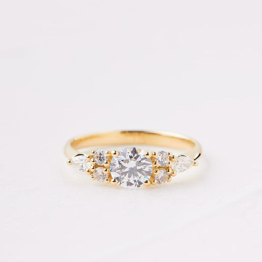 An engagement ring set with a half carat round natural diamond