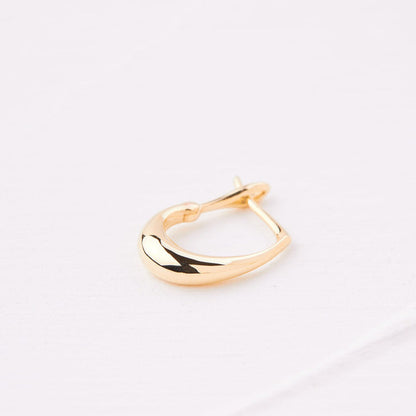 Gold pear hoop earring