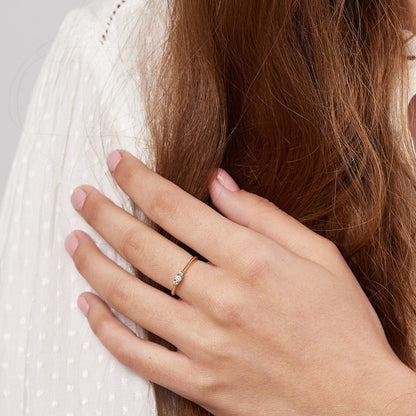 The forest peony ring is studded with natural diamonds