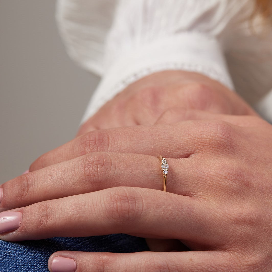 The forest peony ring is studded with natural diamonds