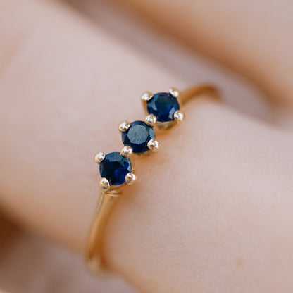 Kingfisher ring with blue sapphires