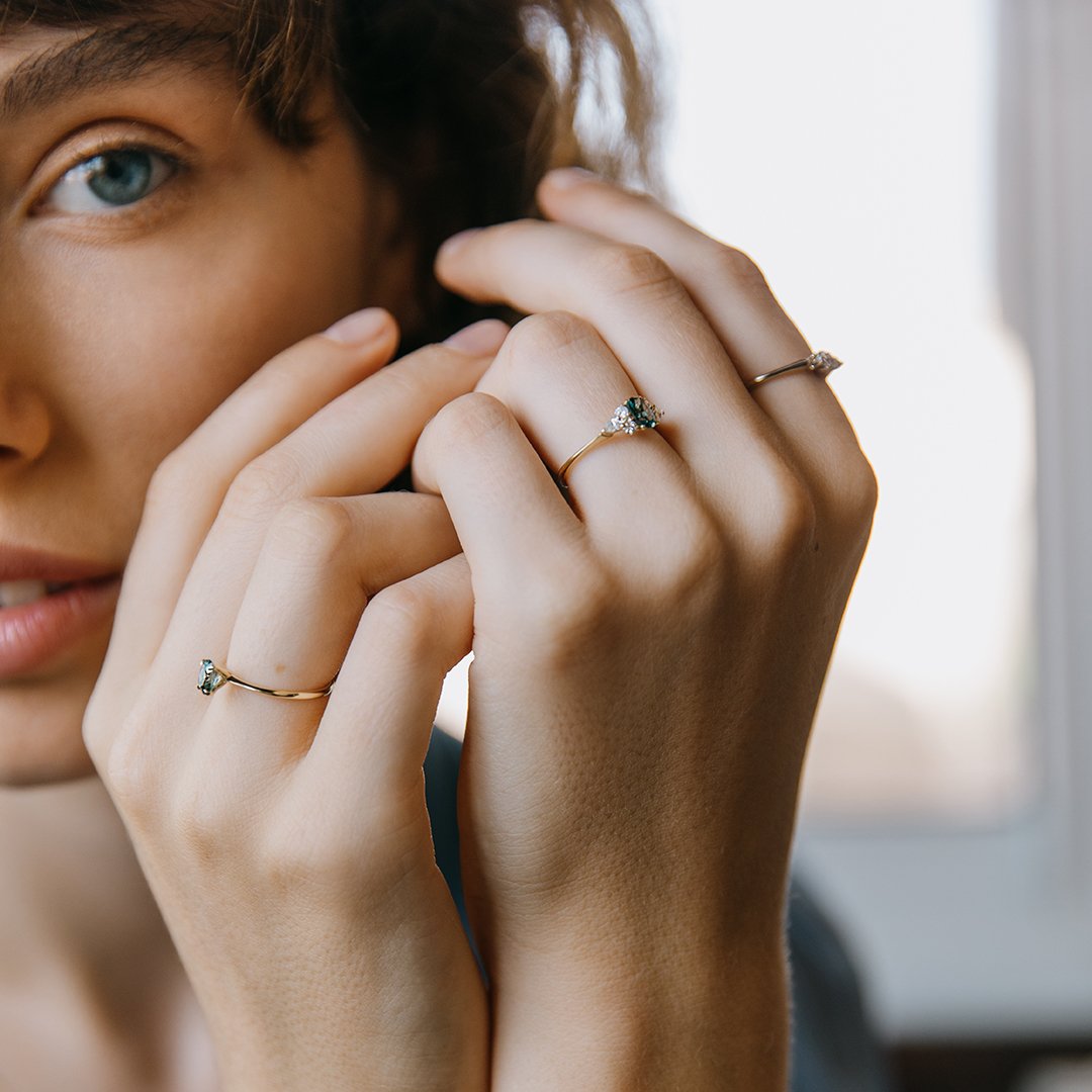 Iris ring set with turquoise sapphires and diamonds