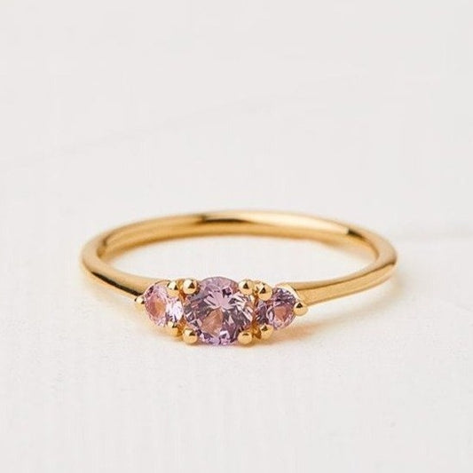 Pink anemone ring with central stone 0.35-0.70 carat
