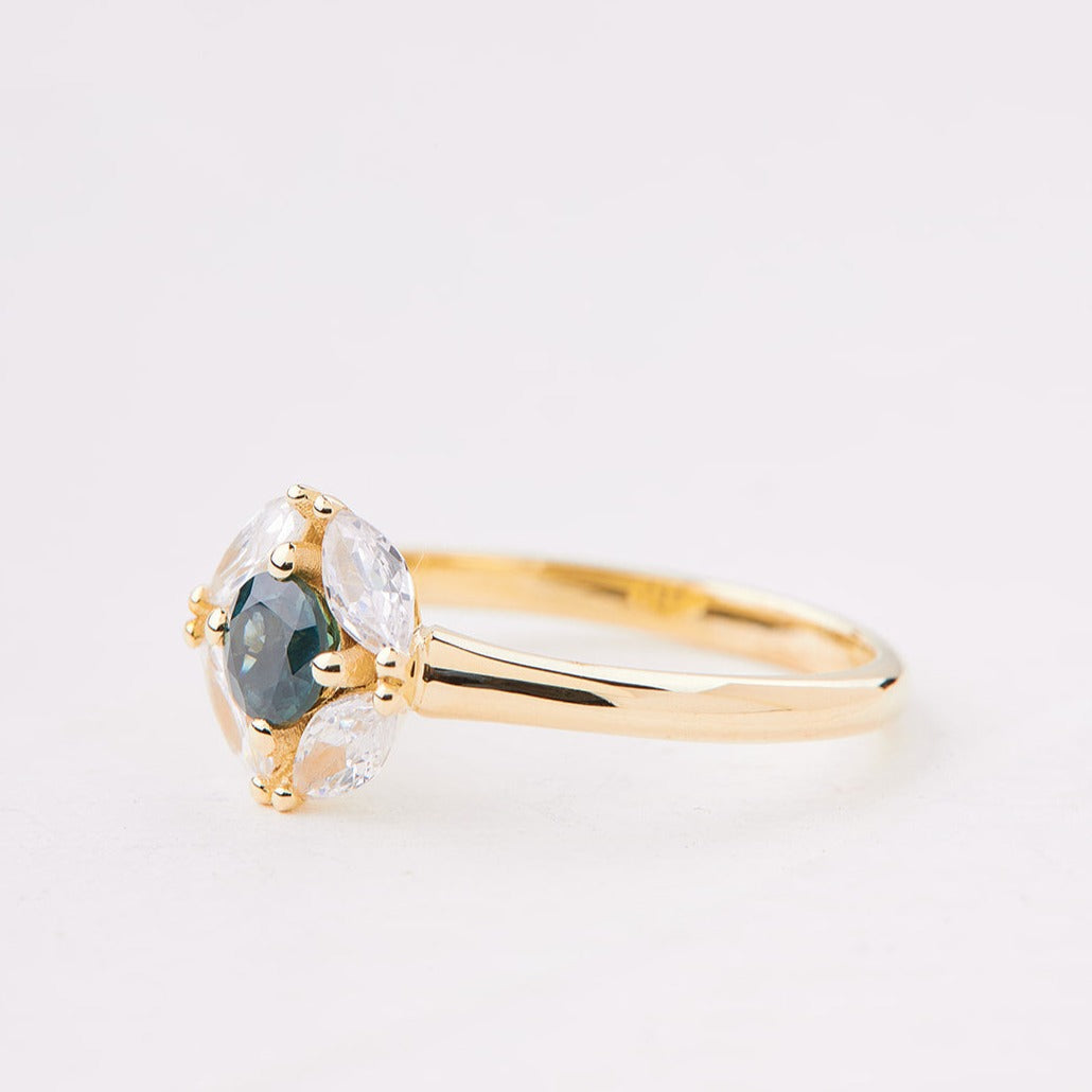 Magritte ring set with turquoise sapphire and diamonds