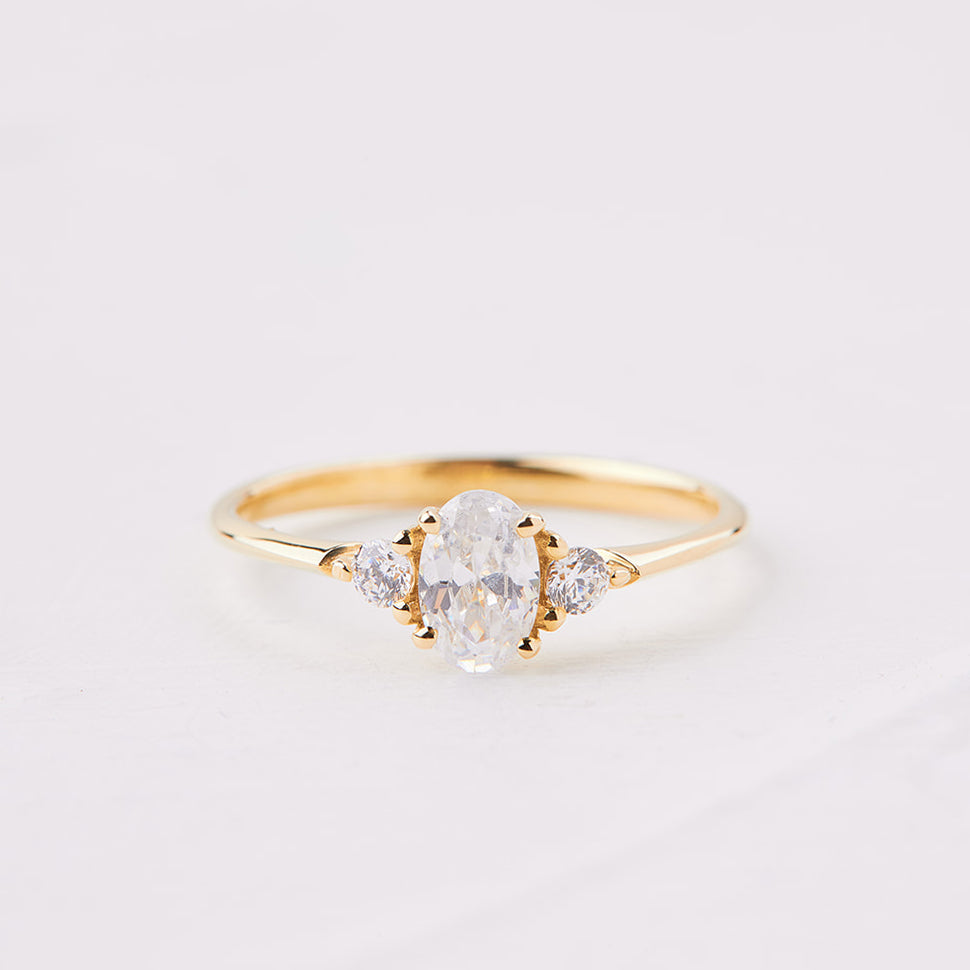 Monet ring set with an oval diamond