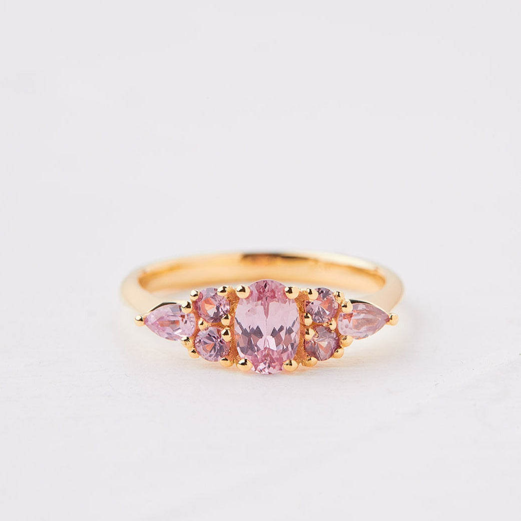 An engagement ring studded with pink sapphires