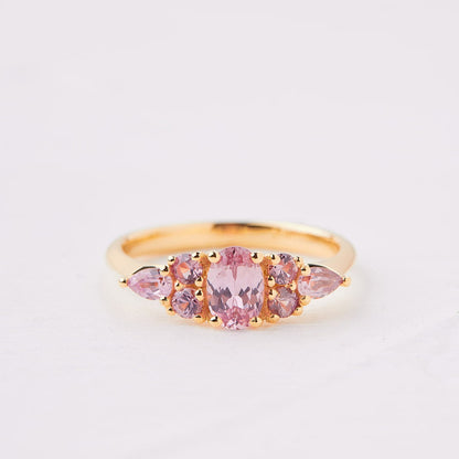 An engagement ring studded with pink sapphires