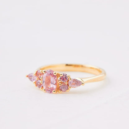 An engagement ring studded with pink sapphires