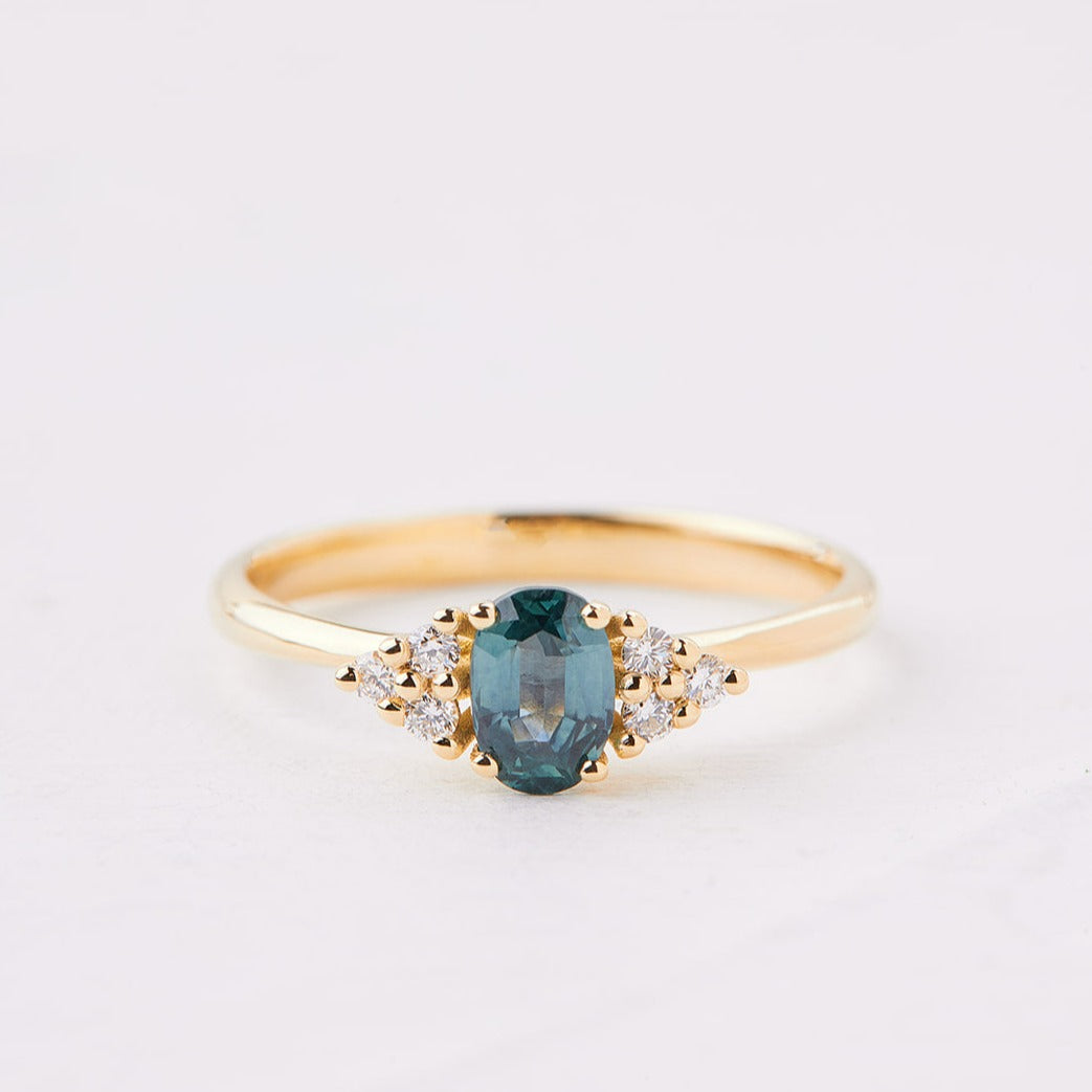 White lily ring with turquoise sapphire stone and lab diamonds