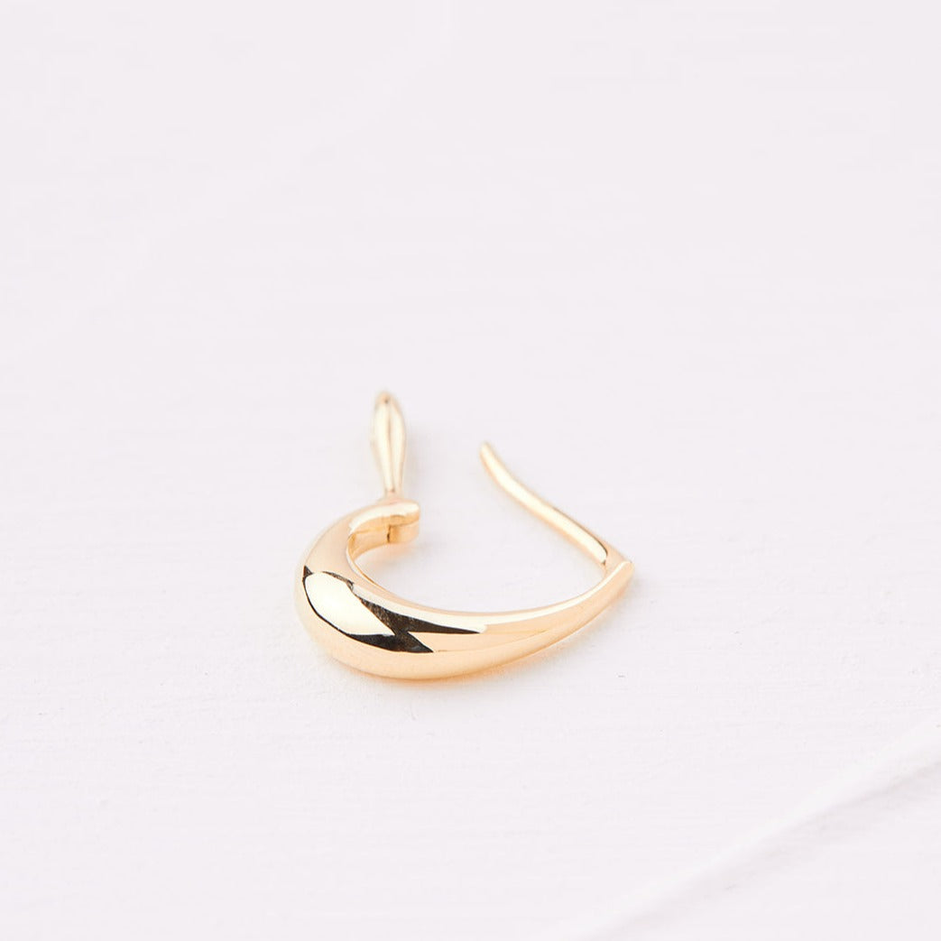 Gold pear hoop earring