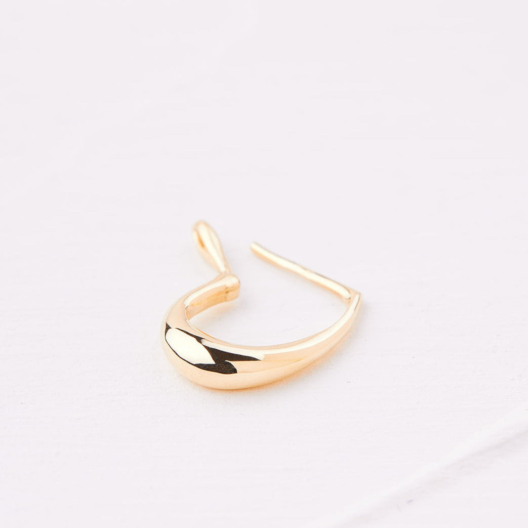 Gold pear hoop earring