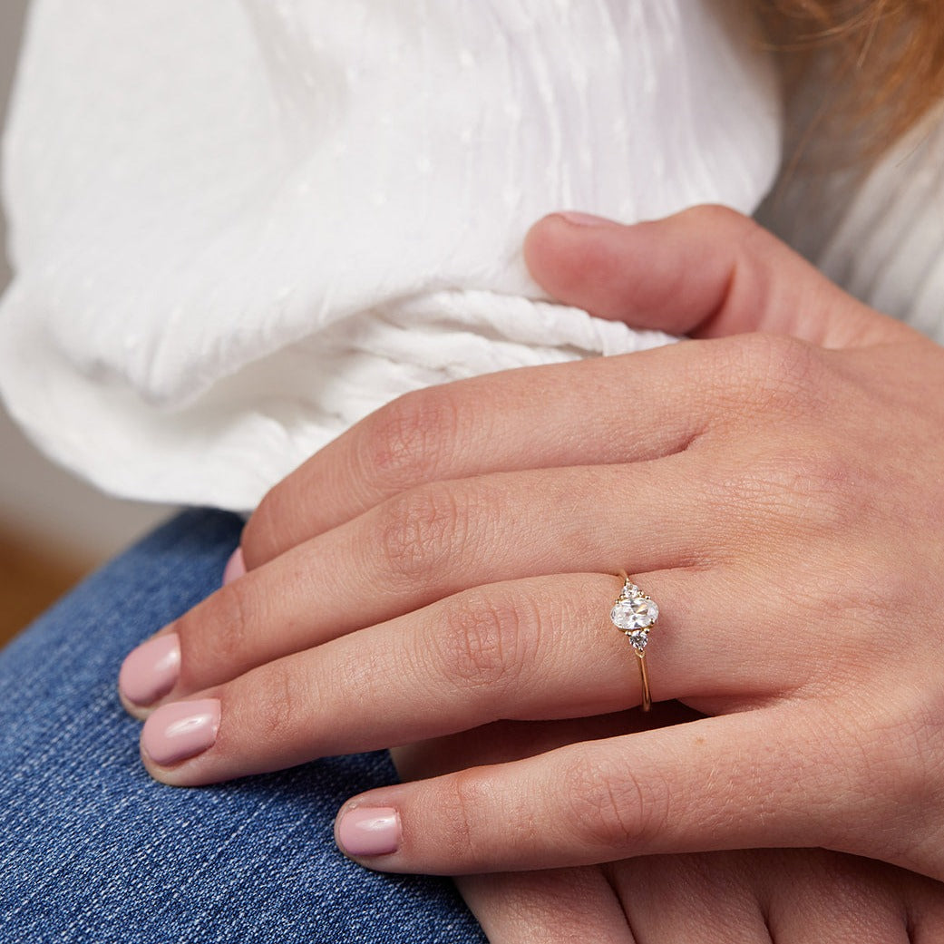 Monet ring set with an oval diamond