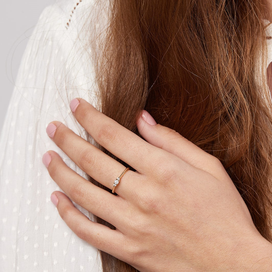 The woodland peony ring is studded with laboratory diamonds