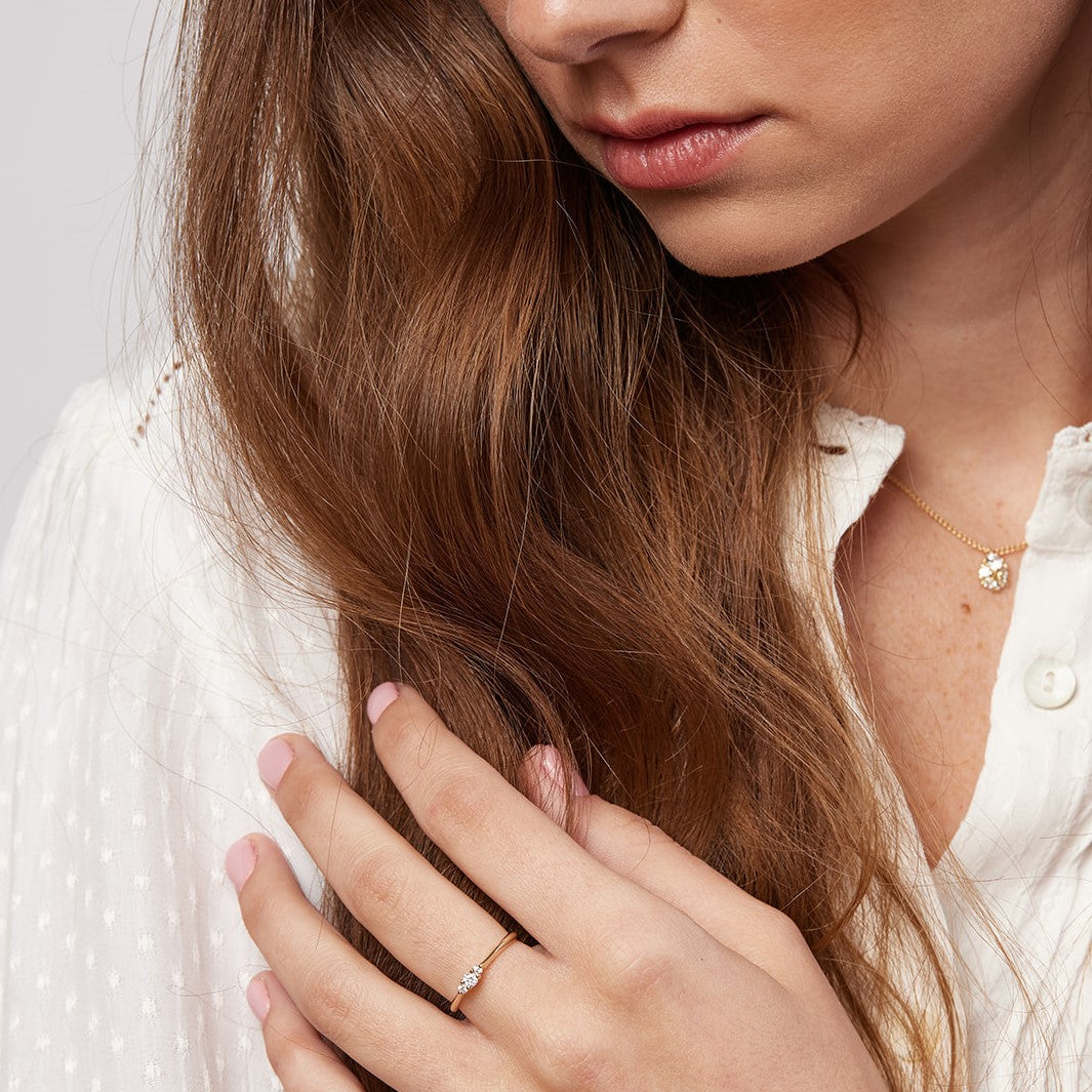 The woodland peony ring is studded with laboratory diamonds