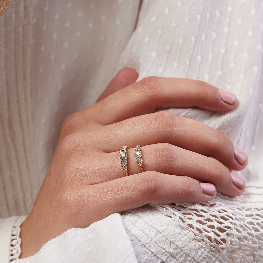 Ripple ring with a center stone of a quarter carat lab diamond