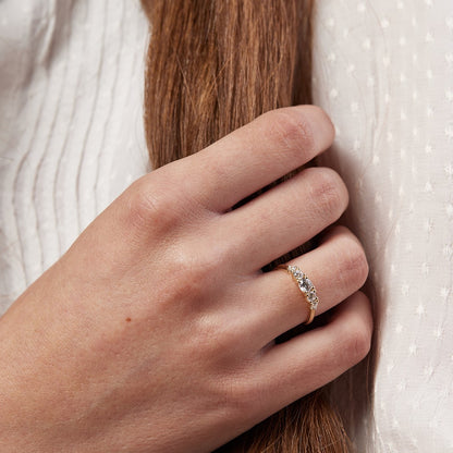 Ripple ring with a center stone of a quarter carat lab diamond