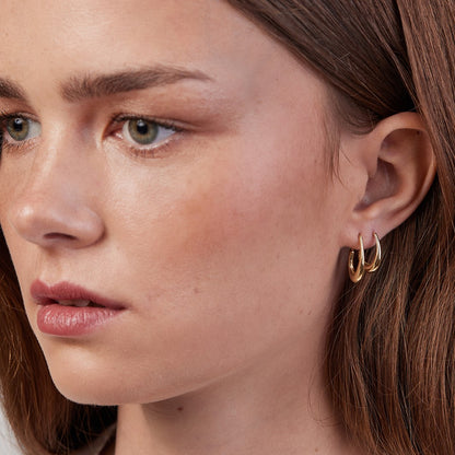 Gold pear hoop earring