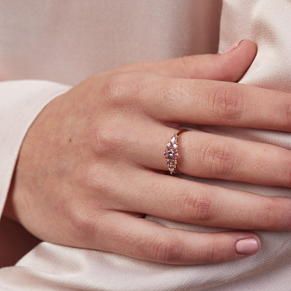 An engagement ring studded with pink sapphires