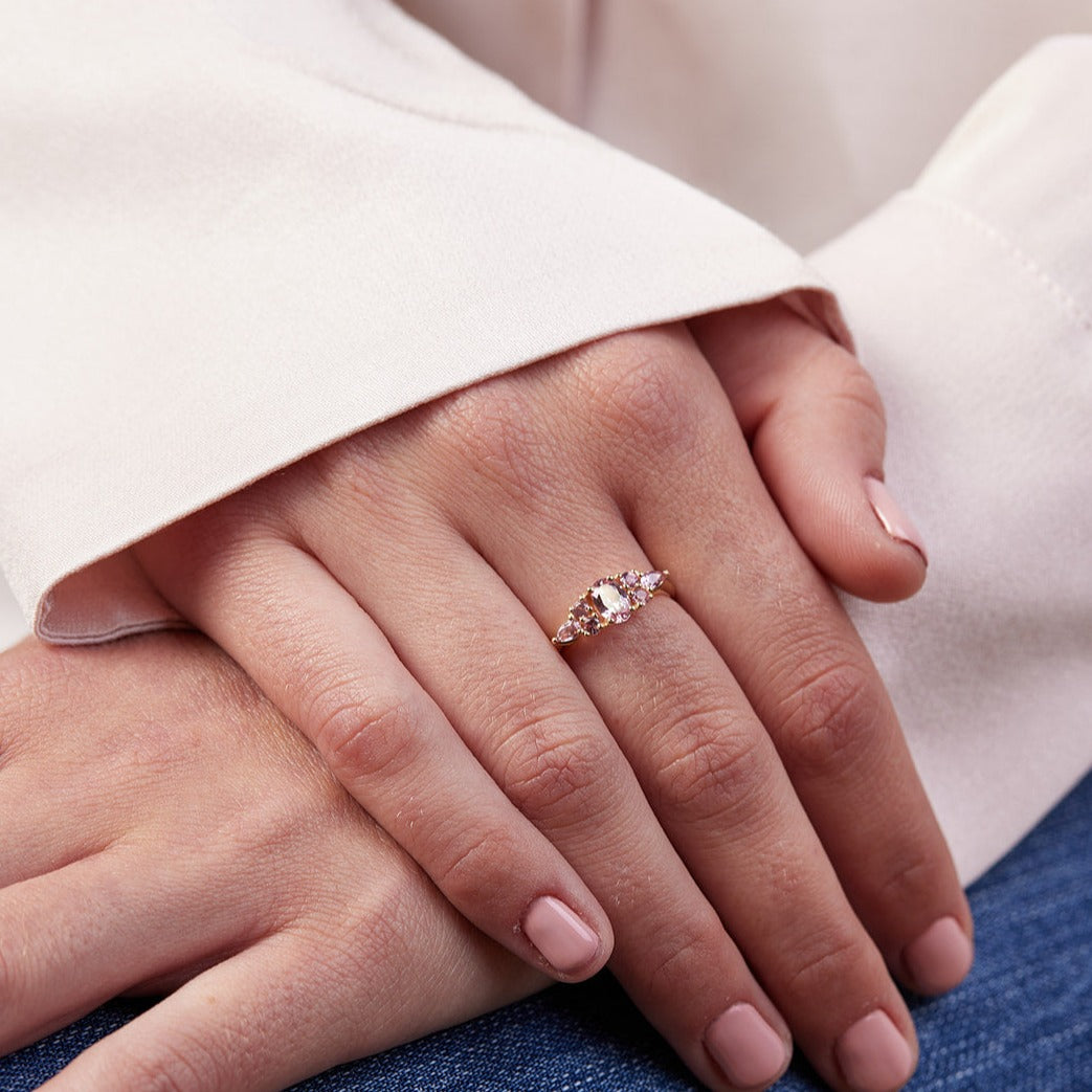 An engagement ring studded with pink sapphires