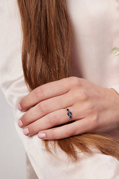 Mondrian ring set with blue sapphire stones