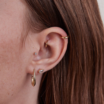 Large gold hoop piercing